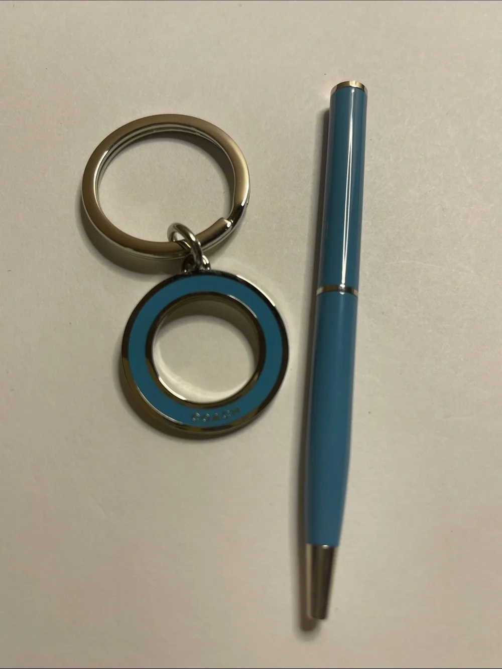 Coach Blue Enamel Circle Keyring and Coach Pen